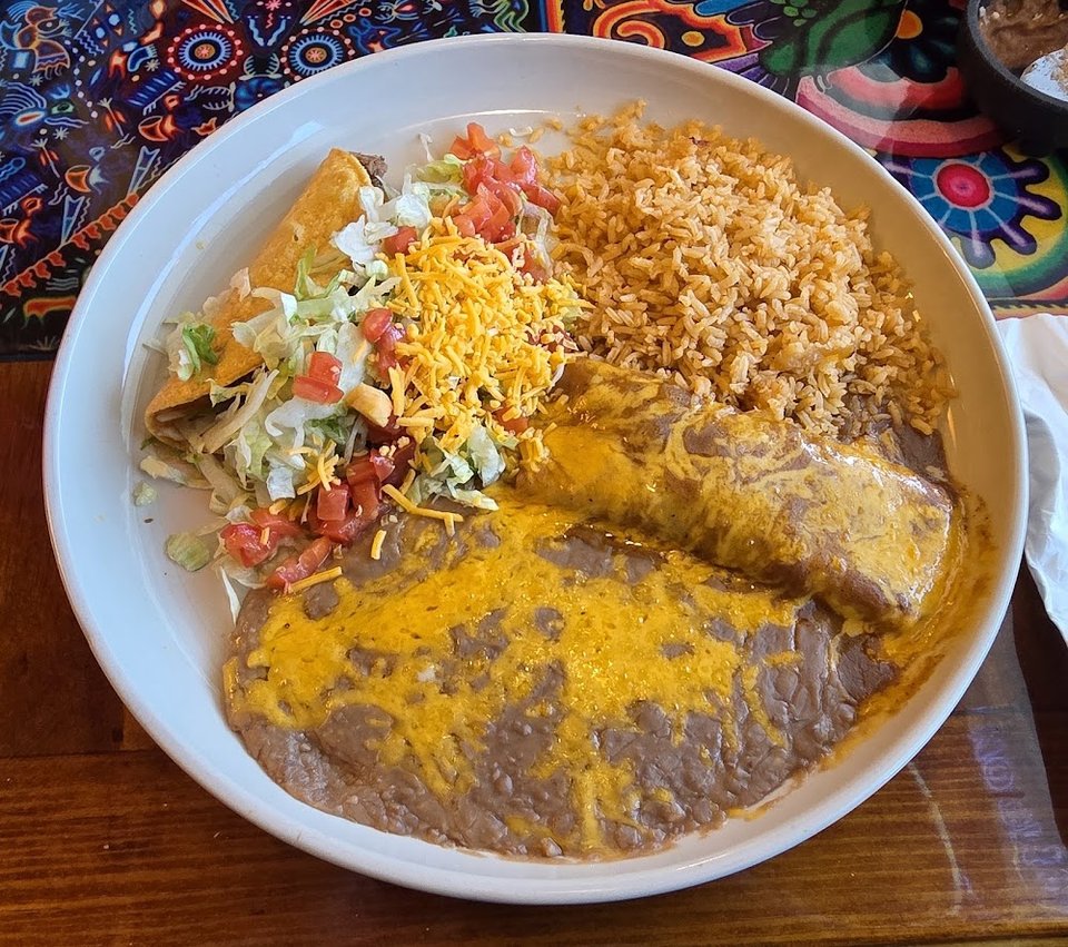 Printed menu with fajitas and seafood options.
