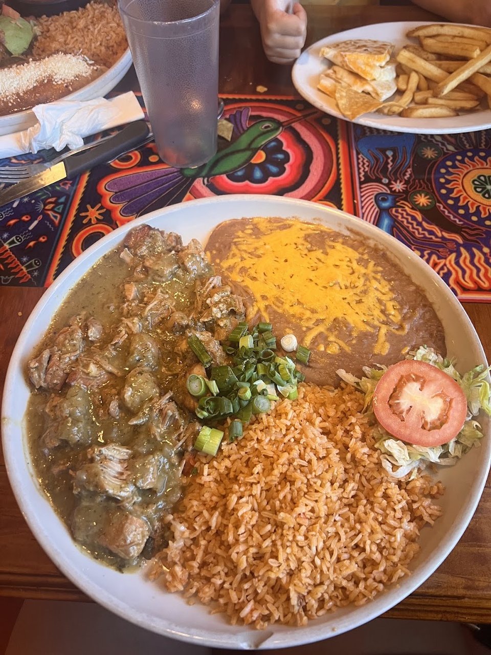 Printed menu with fajitas and seafood options.